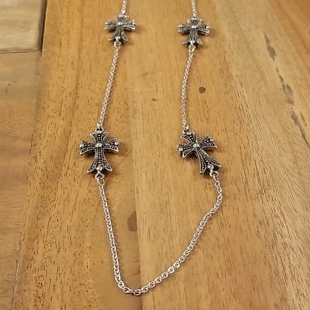 Approximately 40 inch necklace with 6 crosses